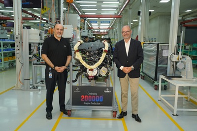Force Motors Rolls-out 200,000ᵗʰ Mercedes-Benz Engine in India 3 Mr. Prasan Firodia and Dr. Joerg Burzer with the 200000th Mercedes-Benz Engine Roll-out
