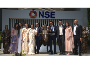 Mr. Subodh Subhash Runwal, Chairman and MD, Runwal Enterprises Limited, along with his family, at the iconic Bull statue at the NSE,